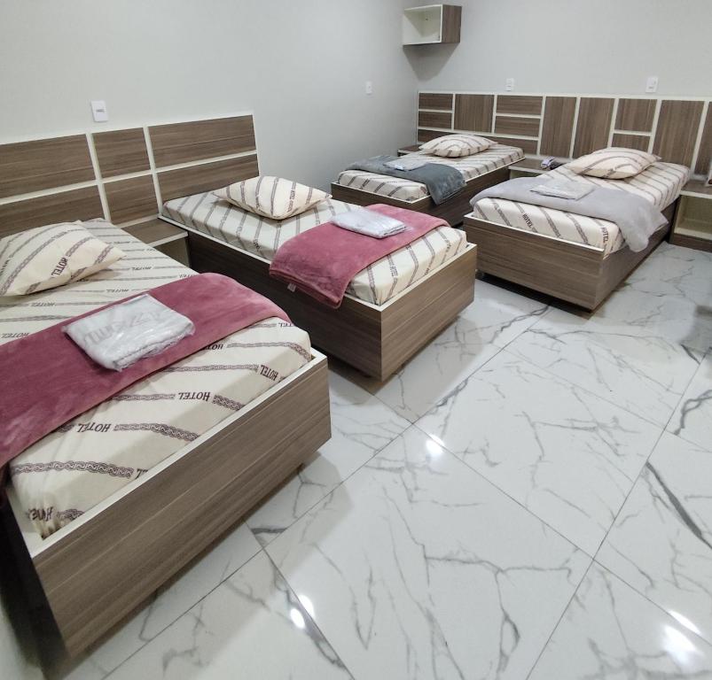 Katil atau katil-katil dalam bilik di Hotel Zafira