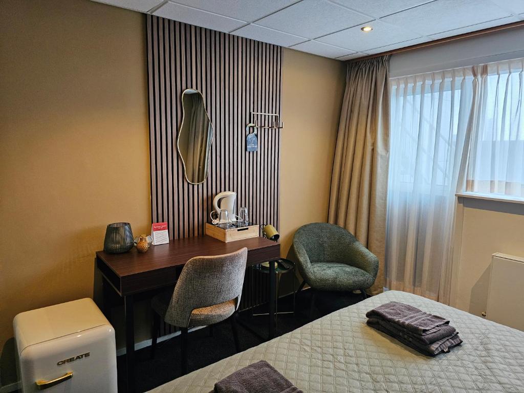 Postel nebo postele na pokoji v ubytování Hotel Restaurant Solskin