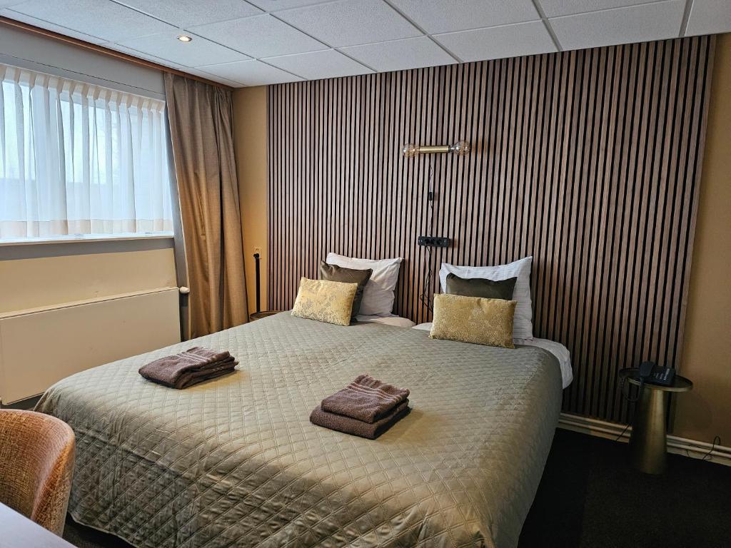 Postel nebo postele na pokoji v ubytování Hotel Restaurant Solskin