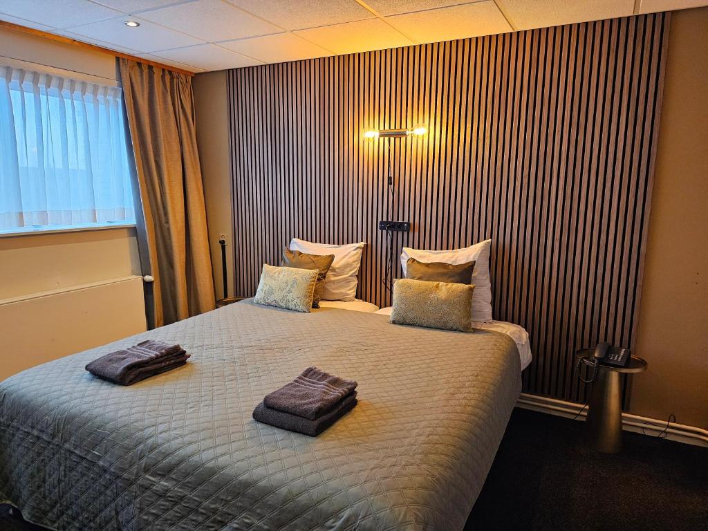 Postel nebo postele na pokoji v ubytování Hotel Restaurant Solskin