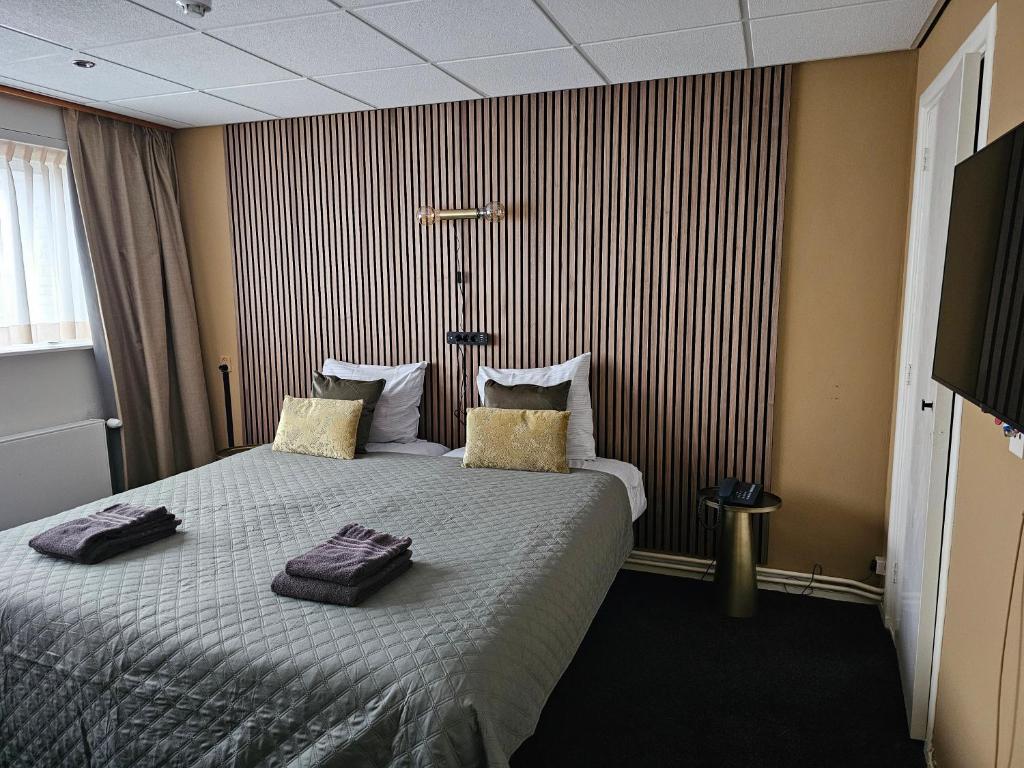 Postel nebo postele na pokoji v ubytování Hotel Restaurant Solskin