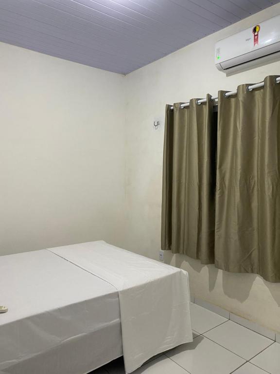 Postel nebo postele na pokoji v ubytování Casa por temporada