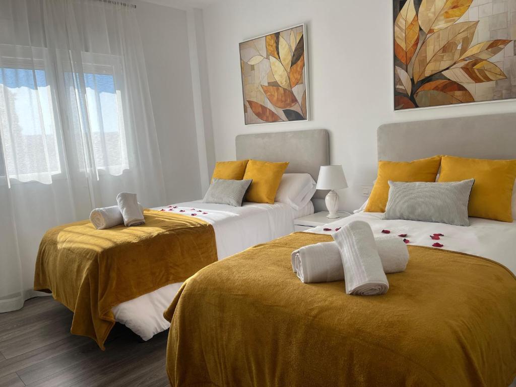Postel nebo postele na pokoji v ubytování Casa Alpha