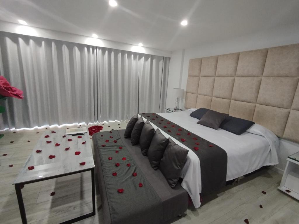 Postel nebo postele na pokoji v ubytování Mirador samsara Suite Luxury piso completo
