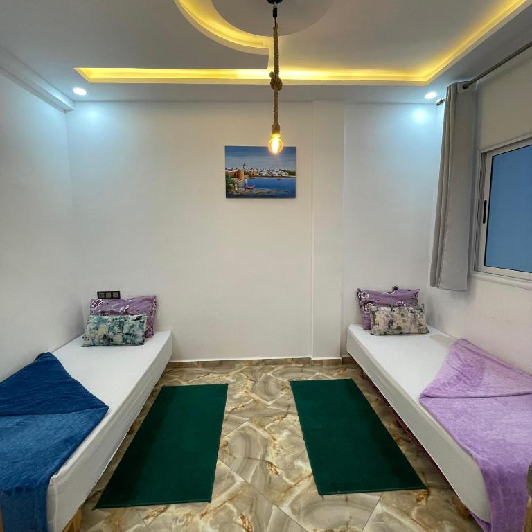 Postel nebo postele na pokoji v ubytování Padova Surf House