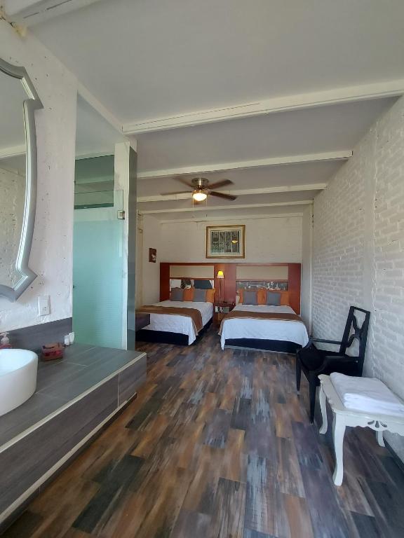 Casa de la O Hotel Boutique - Deluxe Queen Room Con Dos Camas Queen