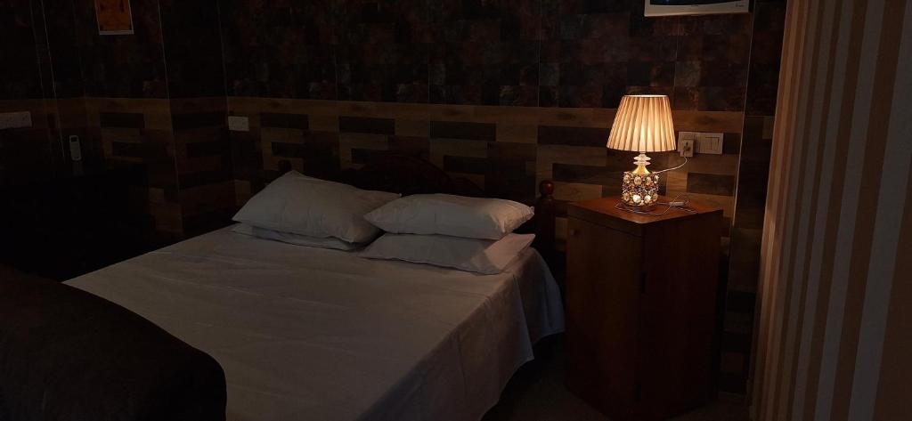Ένα ή περισσότερα κρεβάτια σε δωμάτιο στο Malee home stay