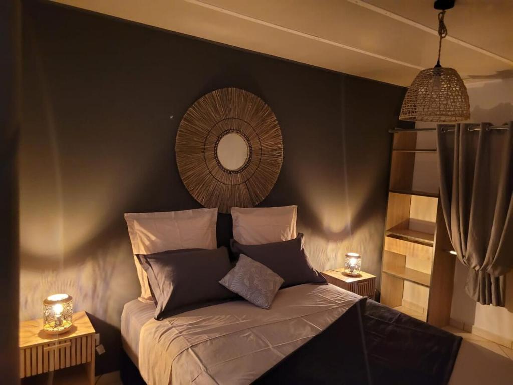 Krevet ili kreveti u jedinici u okviru objekta Villa Lé fé péi 3 étoiles