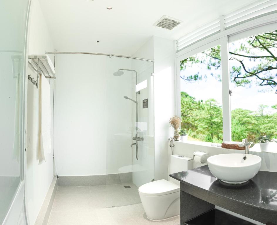 Phòng tắm tại Le Huynh Mui Ne Hotel