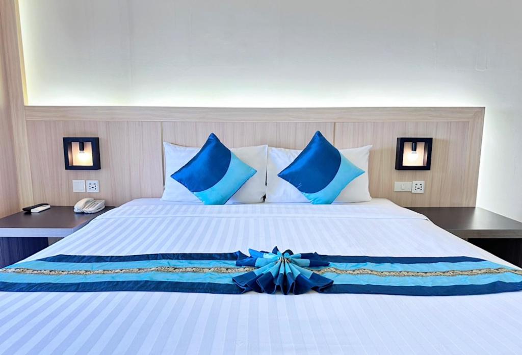 Postel nebo postele na pokoji v ubytování O2 Luxury Hotel