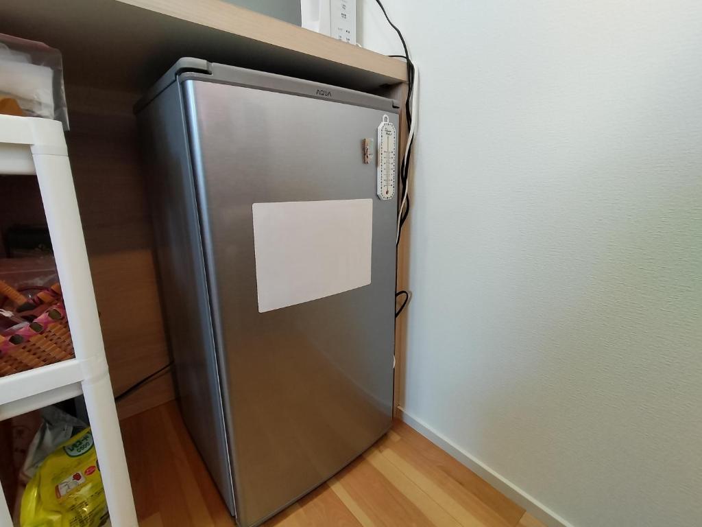 Kuchyň nebo kuchyňský kout v ubytování aouei
