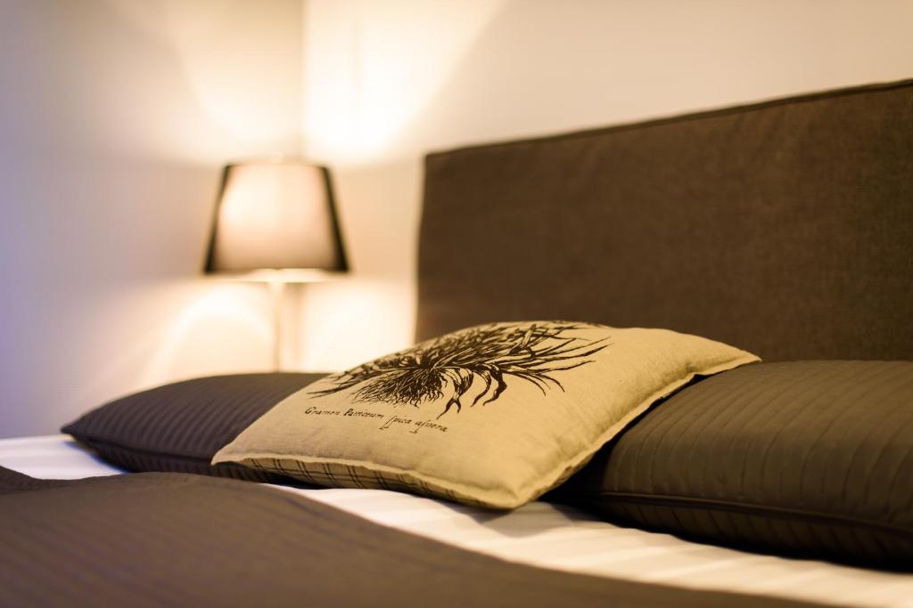 Postel nebo postele na pokoji v ubytování Hornavan Hotell