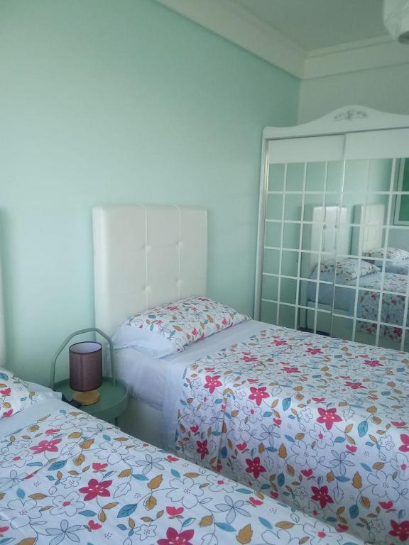 Letto o letti in una camera di AppartF3 vue panoramique sur mer Residence Vista Del Mar