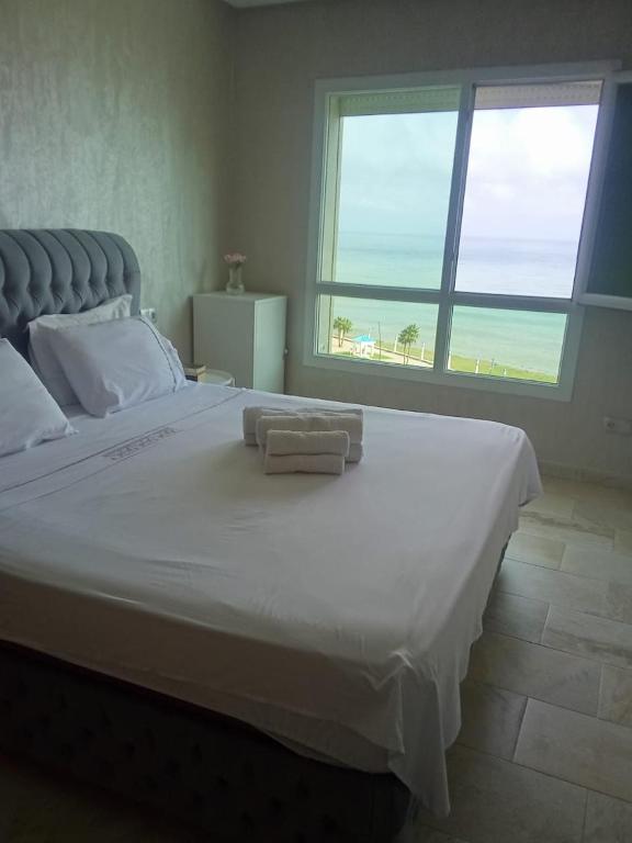 Letto o letti in una camera di AppartF3 vue panoramique sur mer Residence Vista Del Mar