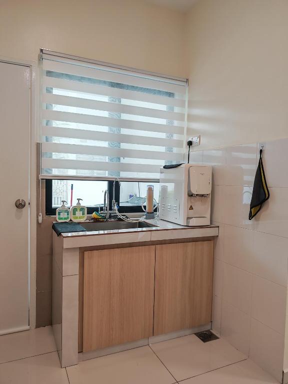 Kuchyň nebo kuchyňský kout v ubytování No 8 Homestay