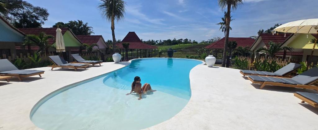 Bazén v ubytování United Colors of Bali Nature nebo v jeho okolí