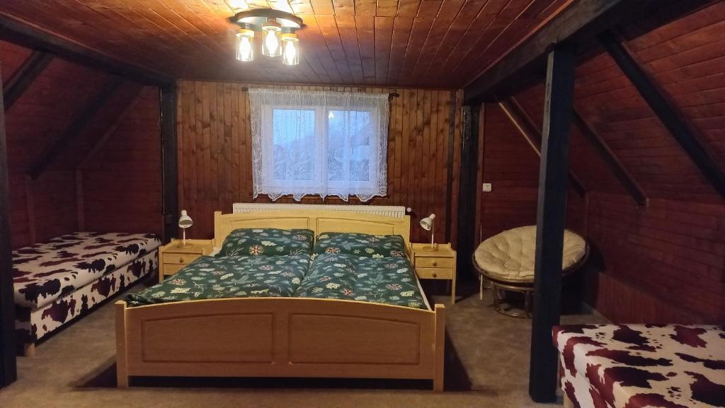 Postel nebo postele na pokoji v ubytování Chalupa na lužické stezce