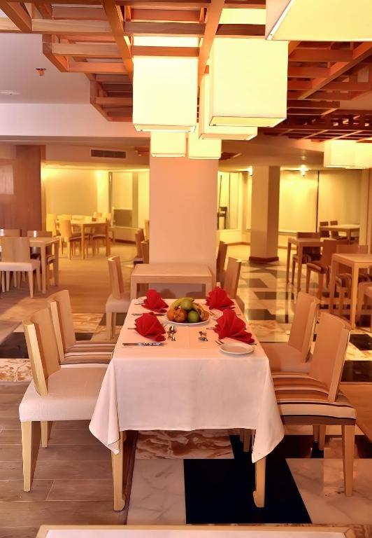 Restaurace v ubytování Swiss Heaven Sharming Inn Hotel - Couples & Families Only