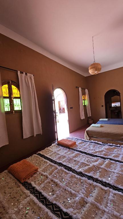 Letto o letti in una camera di Dar M'hamid