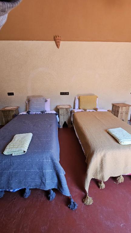 Letto o letti in una camera di Dar M'hamid