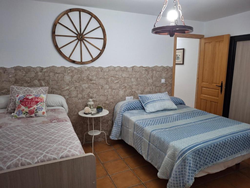 Posteľ alebo postele v izbe v ubytovaní Alojamiento Rural Mi Frasca