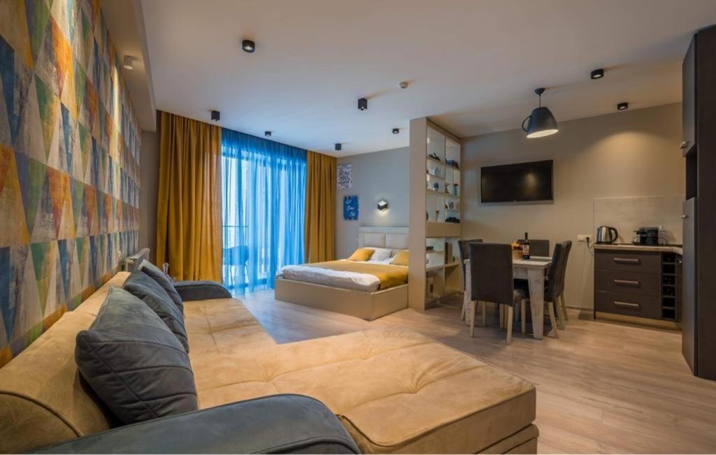 Postel nebo postele na pokoji v ubytování New Gudauri GN Apartments in Atrium