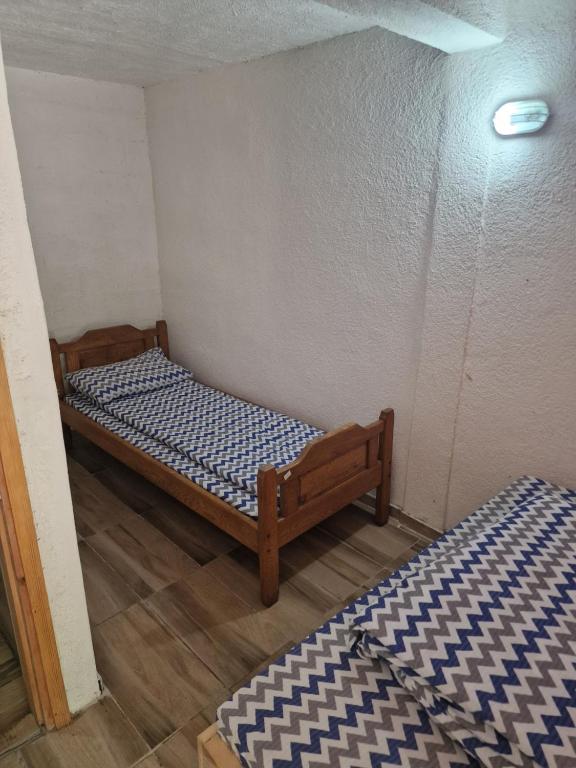 Postel nebo postele na pokoji v ubytování Rafting kamp Ivona