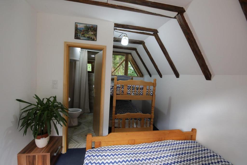 Postel nebo postele na pokoji v ubytování Rafting kamp Ivona