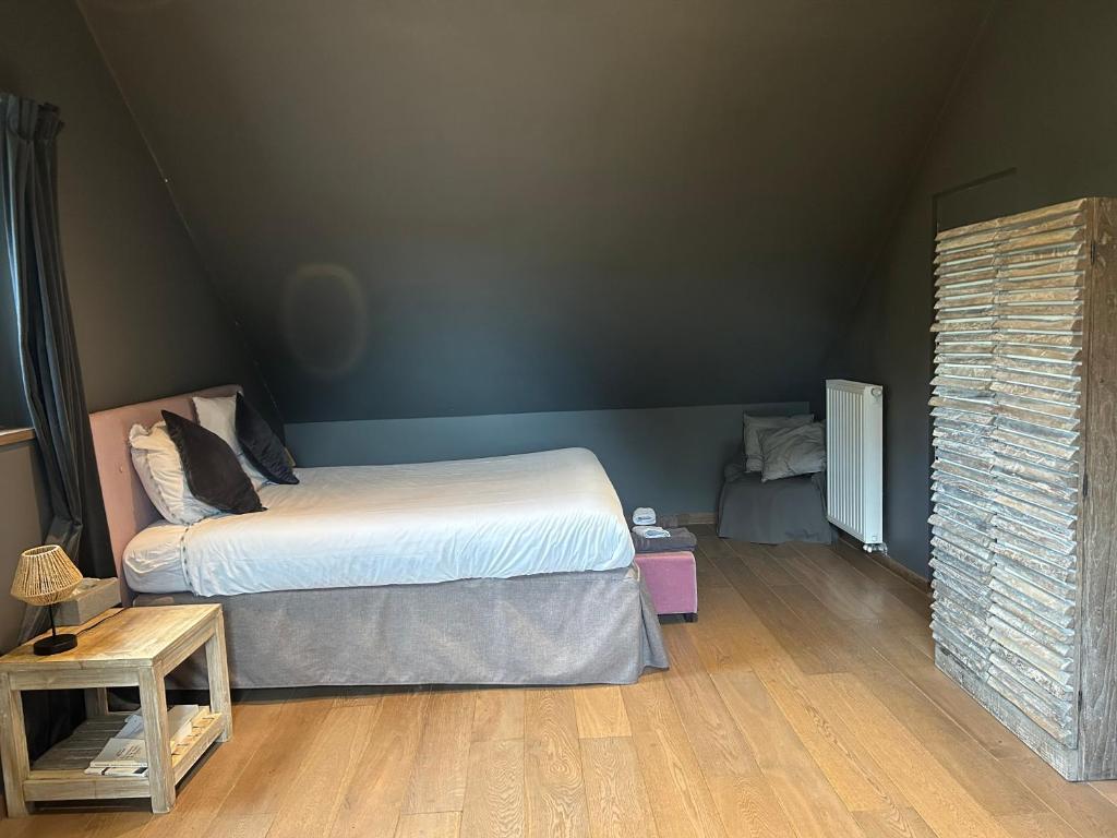 Postel nebo postele na pokoji v ubytování B&B Des Heures Claires