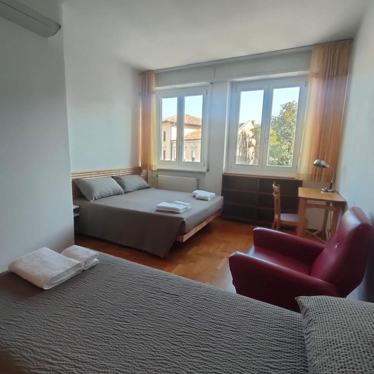 Postel nebo postele na pokoji v ubytování Radetzky Rooms