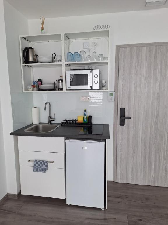 Kuchyň nebo kuchyňský kout v ubytování Tilka`s house