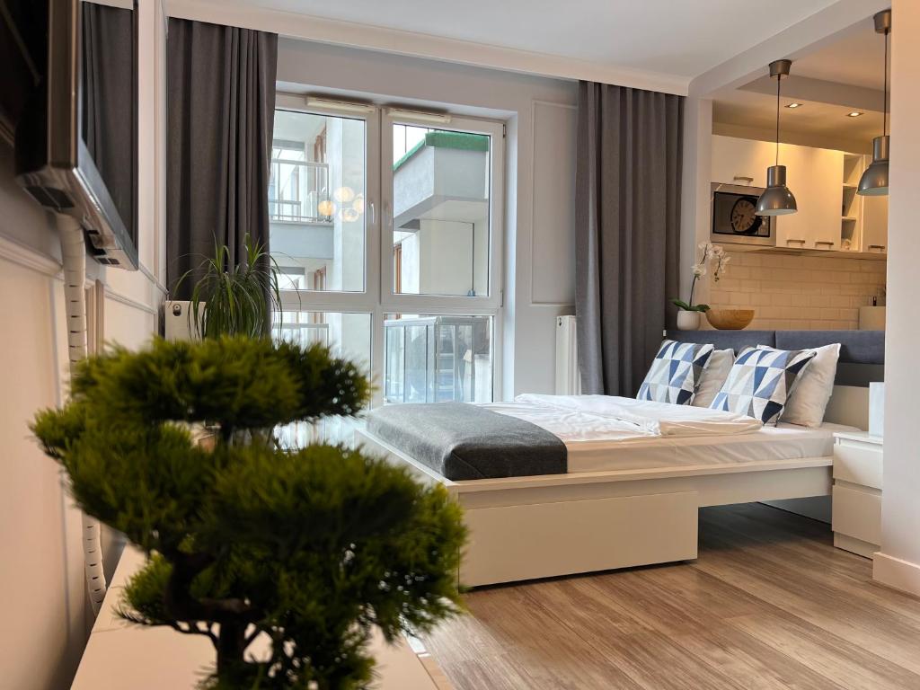 Posteľ alebo postele v izbe v ubytovaní Airport Apartment Warszawa
