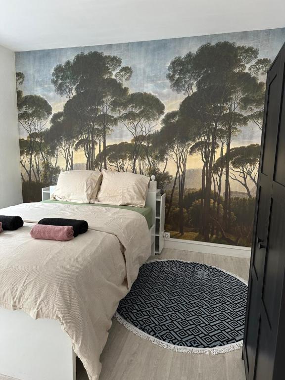 Ένα ή περισσότερα κρεβάτια σε δωμάτιο στο Appartement cosy en centre ville de Dunkerque avec balcon & parking avec portail privé - place non nominative