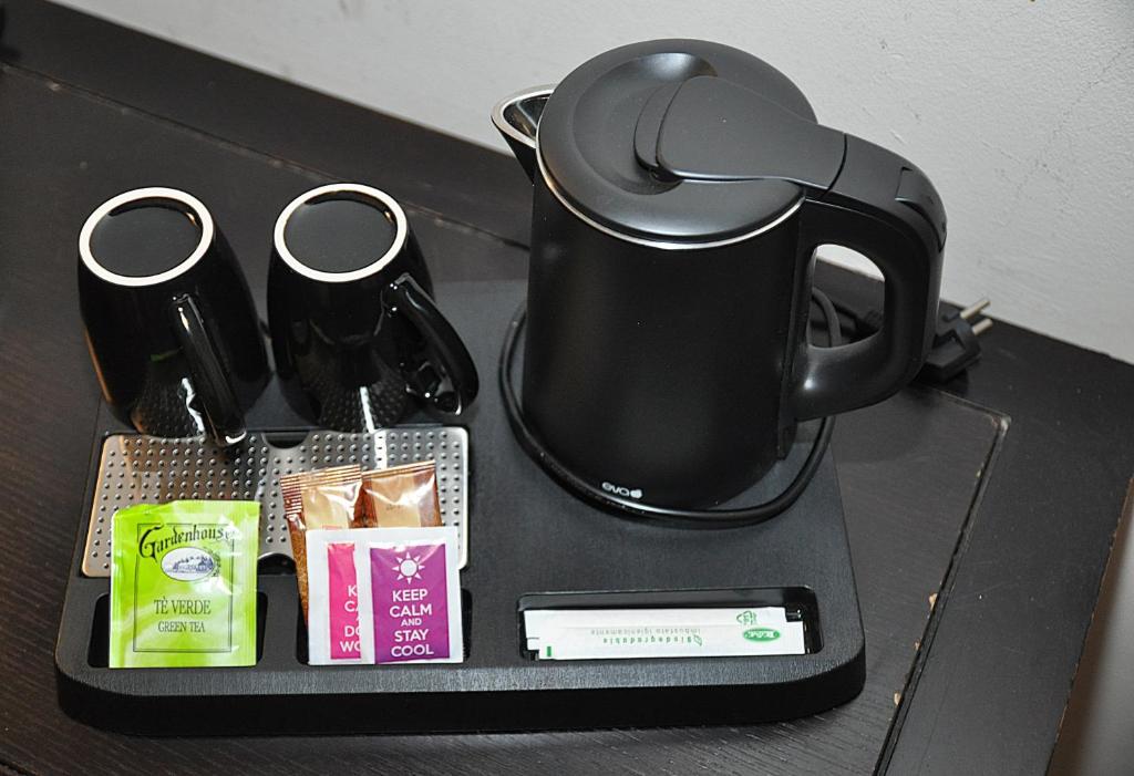 Příslušenství pro přípravu čaje a kávy v ubytování Hotel Comtur