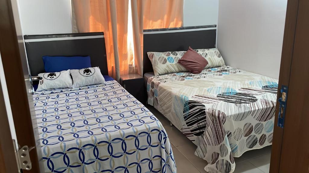 Postel nebo postele na pokoji v ubytování Palina Village Casa 12 - San Bernardino