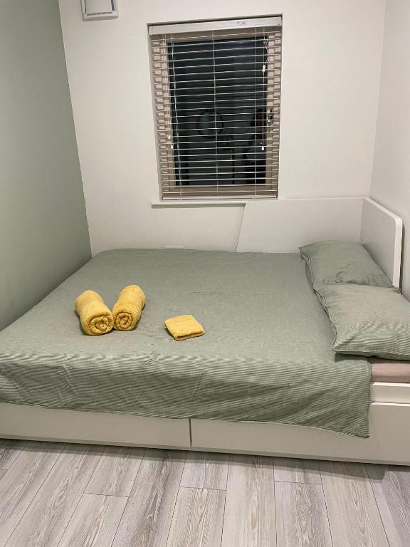 Postel nebo postele na pokoji v ubytování Cozy Room
