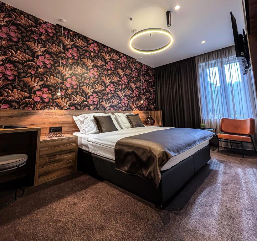 Postel nebo postele na pokoji v ubytování Calma Luxury Rooms