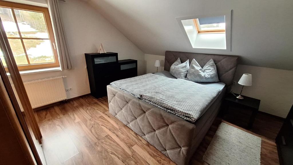 Postel nebo postele na pokoji v ubytování Apartmenthaus Kammblick
