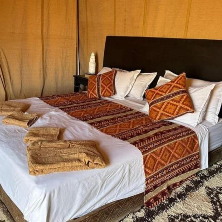 Postel nebo postele na pokoji v ubytování Luxury Trippers Camp