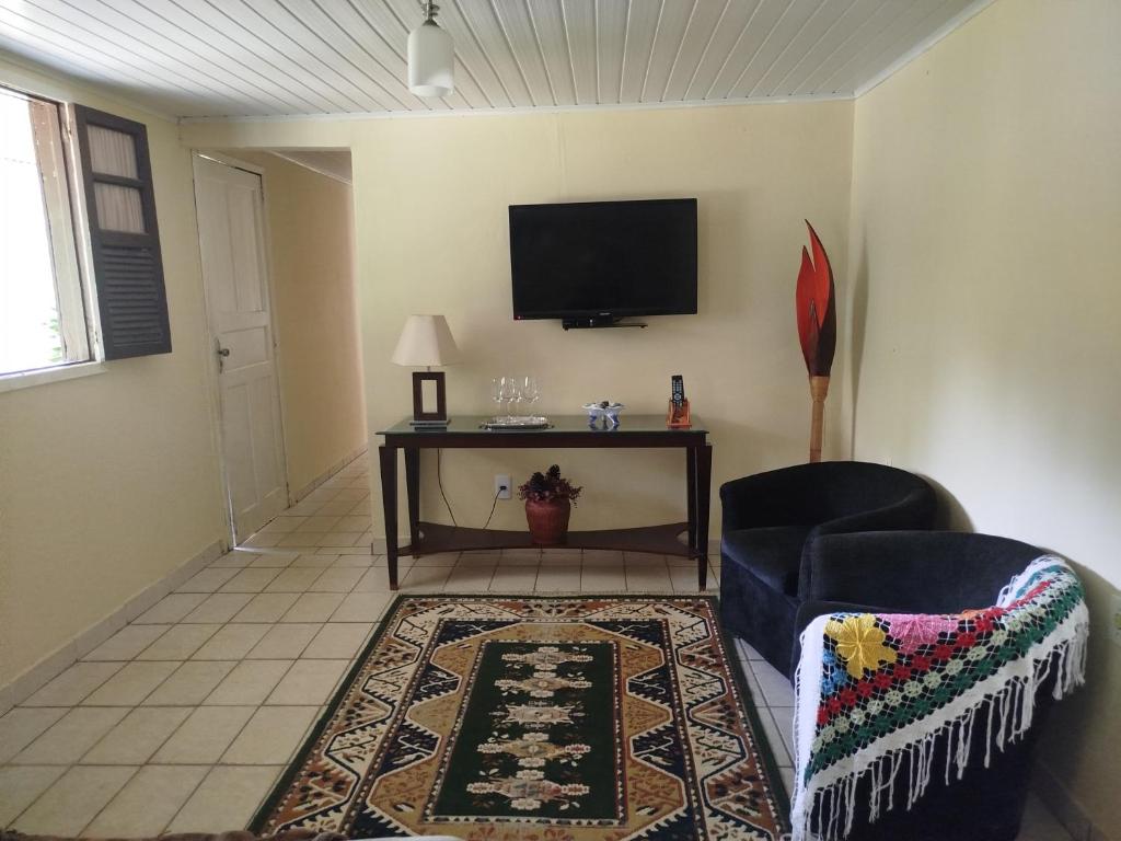 Μια τηλεόραση ή/και κέντρο ψυχαγωγίας στο Casa Recanto das Oliveiras