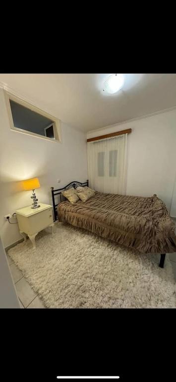 Postel nebo postele na pokoji v ubytování Beach House