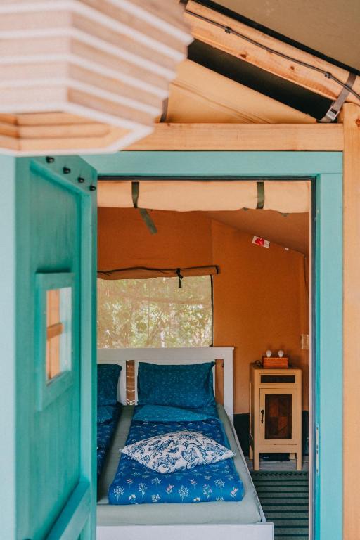 Postel nebo postele na pokoji v ubytování Rendes Glamping