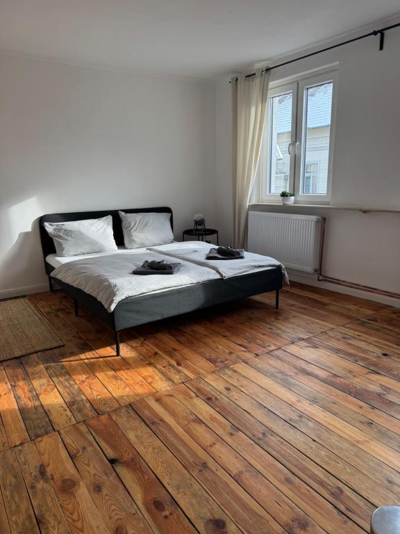 Ένα ή περισσότερα κρεβάτια σε δωμάτιο στο Schönes Zimmer im Zentrum