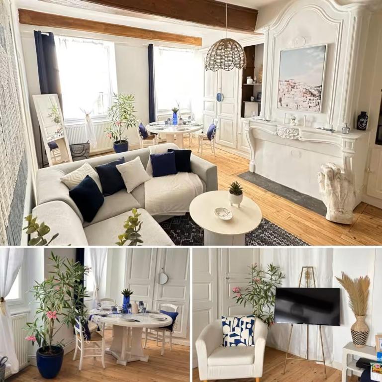 un salon avec un canapé et une table dans l'établissement Le Santorin, à Mâcon