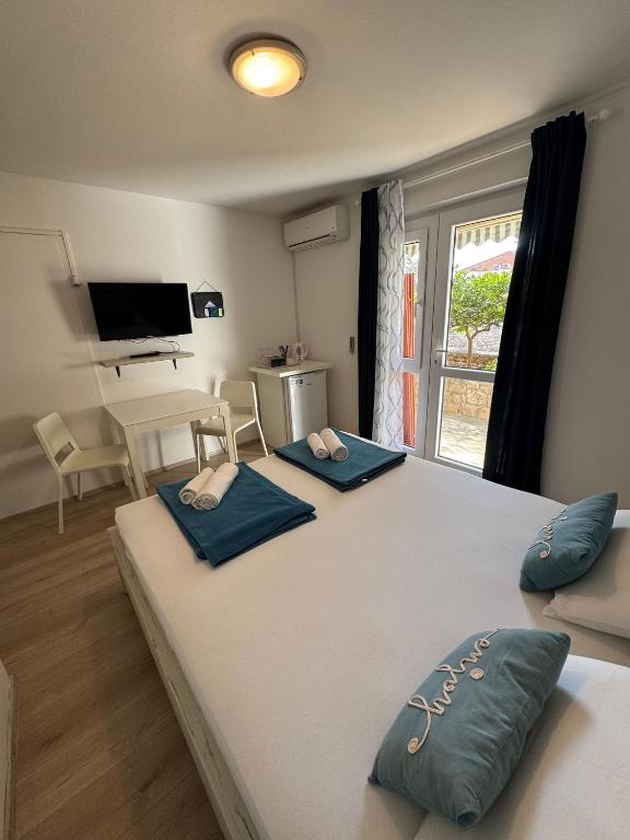 Postel nebo postele na pokoji v ubytování Guest House Kovacevic
