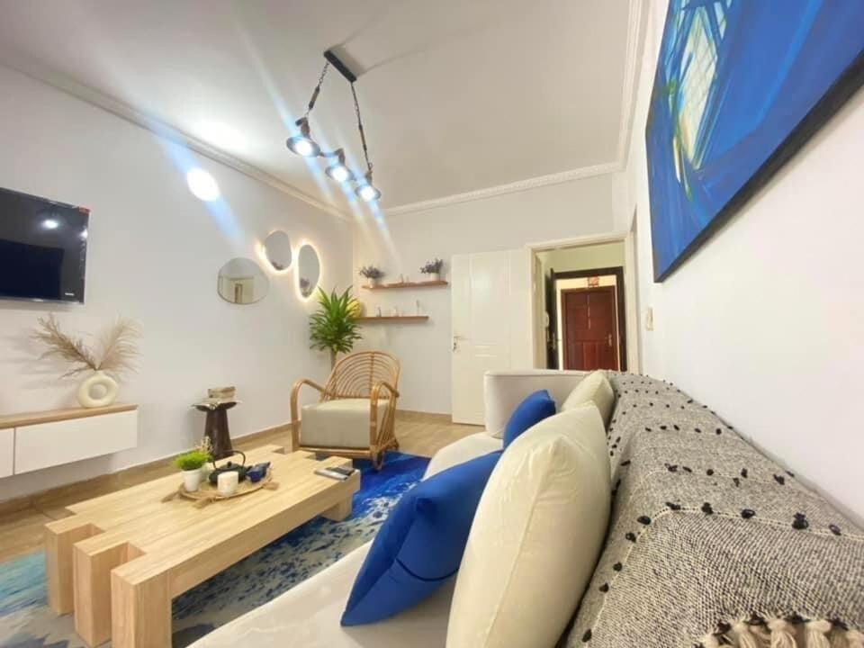 TV a/nebo společenská místnost v ubytování L oiseau bleu