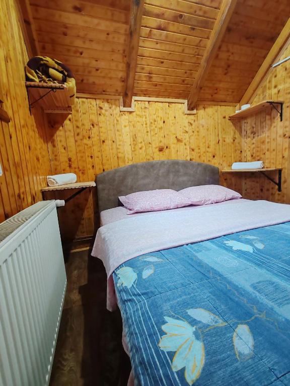 Postel nebo postele na pokoji v ubytování Bungalovi Vukovic