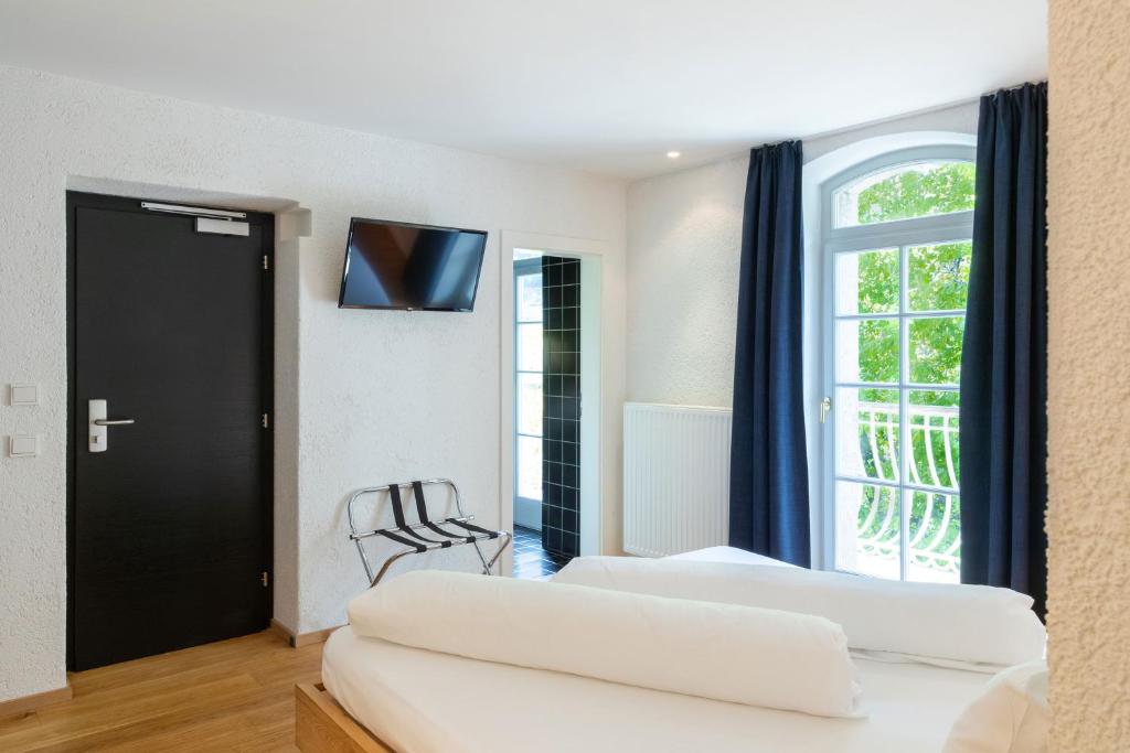 Postel nebo postele na pokoji v ubytování Hotel Sachsenklemme