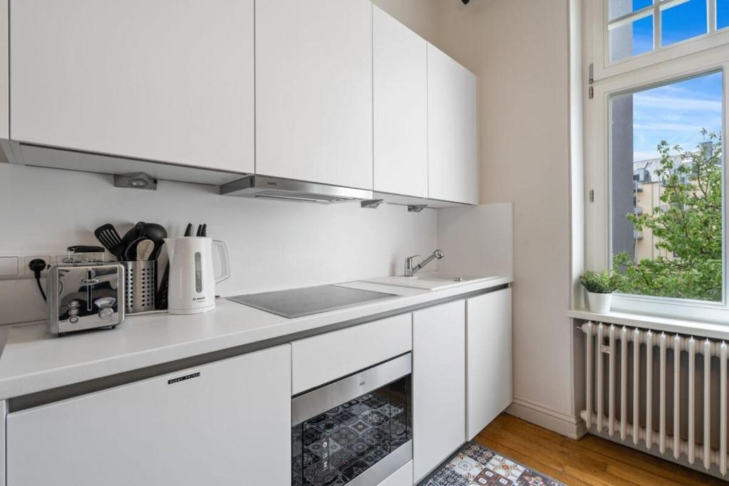 Cucina o angolo cottura di Spacious & Tranquil Rooms in Limpertsberg