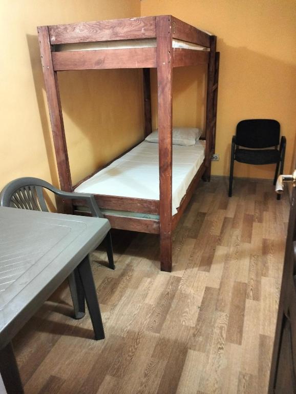 Postel nebo postele na pokoji v ubytování Pershyy Hostel u Cherkasah